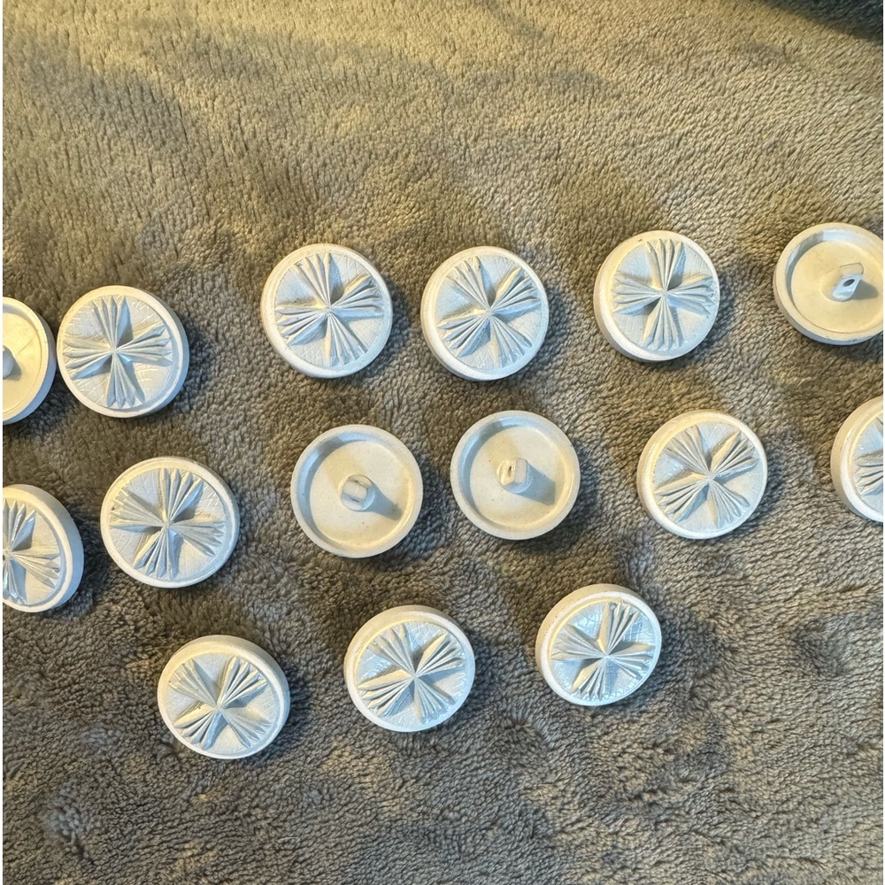 Set of 15 brand new buttons light gray w raised pattern on top approx .75 in ea